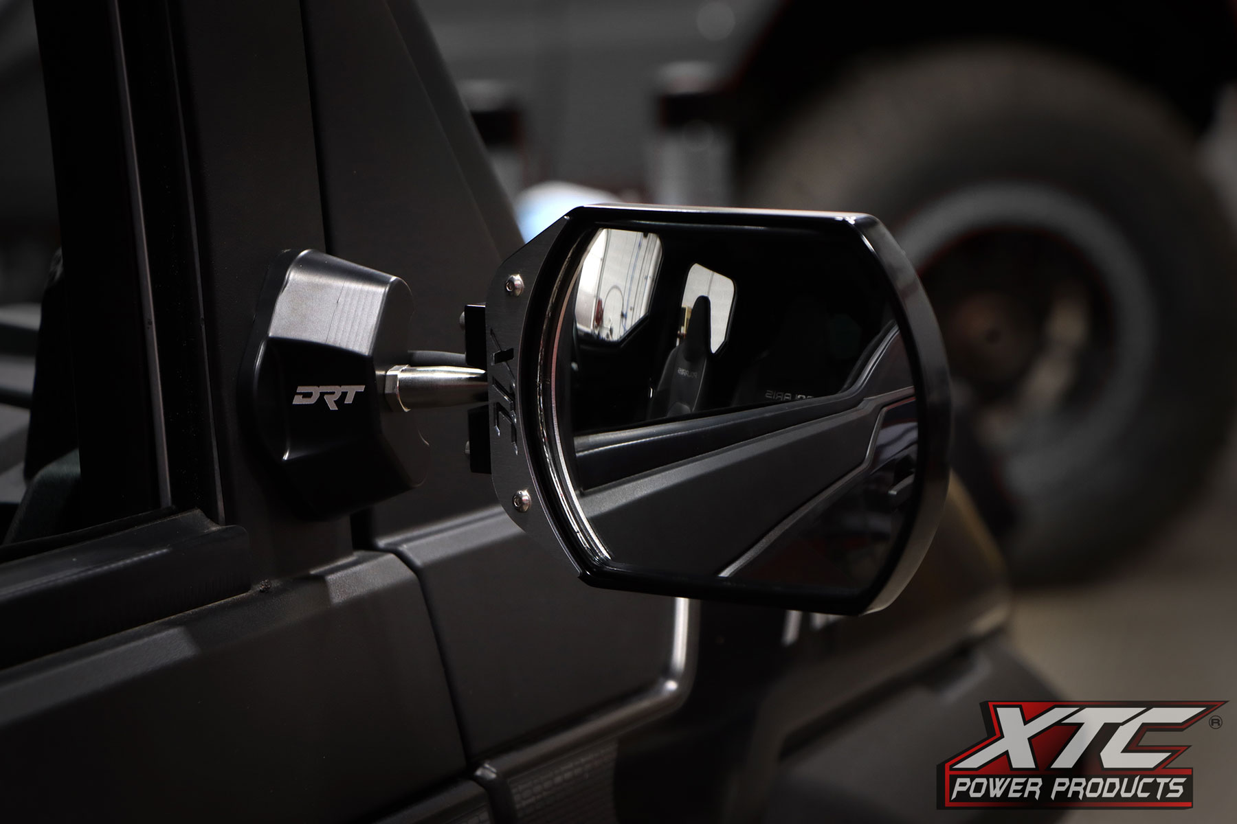 XTC SIX12 Lit Side View Mirror mounted on Polaris XPEDITION with DRT Cab Mounts